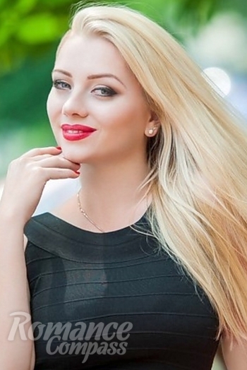 Ukrainian mail order bride Ludmila from Kherson with blonde hair and blue eye color - image 1
