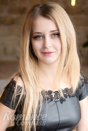 Ukrainian mail order bride Yuliya from Nikolaev with blonde hair and blue eye color - image 1