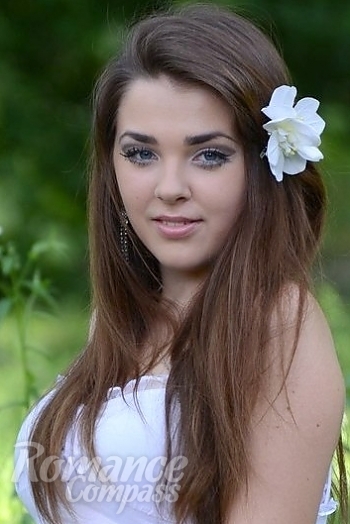 Ukrainian mail order bride Nataliya from Kiev with brunette hair and blue eye color - image 1