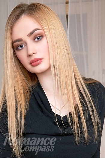 Ukrainian mail order bride Alena from Kiev with blonde hair and blue eye color - image 1