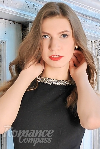 Ukrainian mail order bride Nelya from Kyiv with light brown hair and blue eye color - image 1