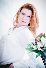 Ukrainian mail order bride Svetlana from Odessa with red hair and green eye color - image 4
