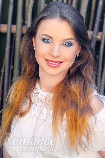 Ukrainian mail order bride Viktoria from Kharkov with light brown hair and blue eye color - image 1