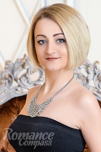 Ukrainian mail order bride Anastasia from Kiev with blonde hair and blue eye color - image 1