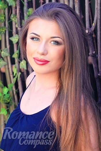 Ukrainian mail order bride Aleksandra from Kharkov with light brown hair and blue eye color - image 1