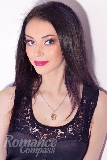 Ukrainian mail order bride Angelica from Kharkov with black hair and hazel eye color - image 1
