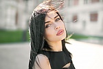 Ukrainian mail order bride Torika from Melitopol with black hair and hazel eye color - image 5