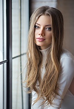 Ukrainian mail order bride Olga from Odessa with light brown hair and blue eye color - image 9