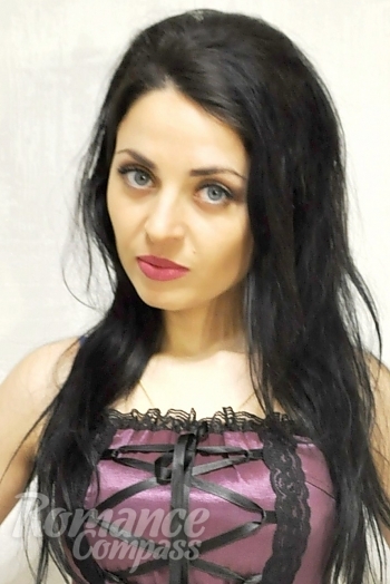 Ukrainian mail order bride Elena from Odessa with black hair and blue eye color - image 1