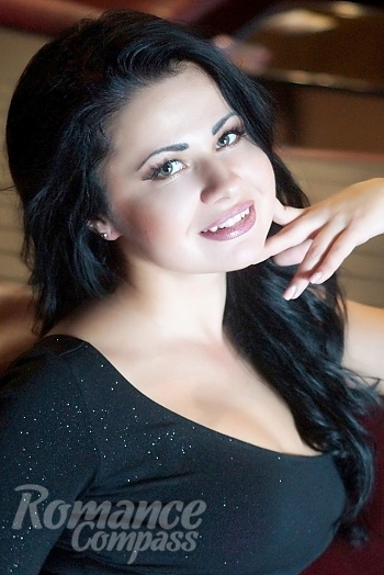 Ukrainian mail order bride Tamara from Odessa with black hair and green eye color - image 1