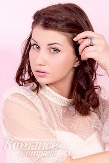 Ukrainian mail order bride Anna from Kiev with brunette hair and green eye color - image 1