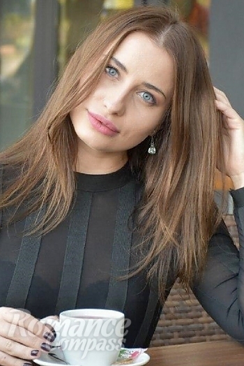 Ukrainian mail order bride Jana from Nikolaev with brunette hair and blue eye color - image 1