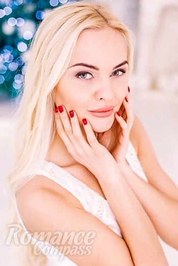 Ukrainian mail order bride Anastasia from Kharkov with blonde hair and blue eye color - image 1