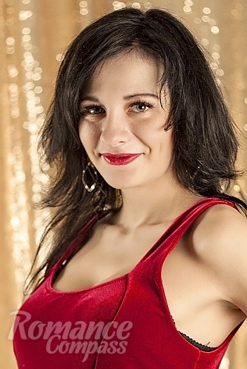 Ukrainian mail order bride Alena from Kiev with black hair and green eye color - image 1