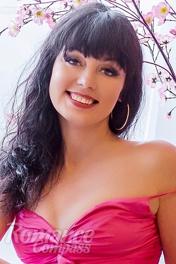 Ukrainian mail order bride Marina from Nikopol with black hair and green eye color - image 1