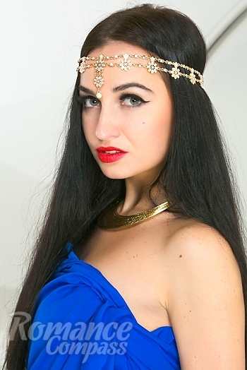 Ukrainian mail order bride Viktoriya from Kiev with black hair and green eye color - image 1