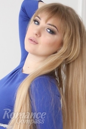 Ukrainian mail order bride Yulia from Donetsk with light brown hair and grey eye color - image 1