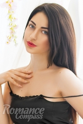 Ukrainian mail order bride Tatyana from Kharkov with black hair and blue eye color - image 1