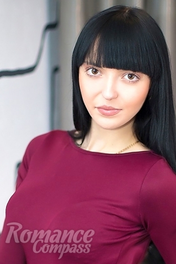 Ukrainian mail order bride Yana from Kiev with black hair and brown eye color - image 1