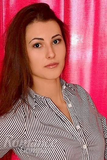 Ukrainian mail order bride Julia from Lugansk with black hair and brown eye color - image 1