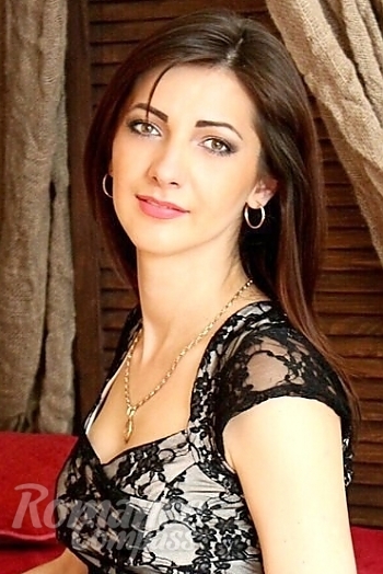 Ukrainian mail order bride Oksana from Kharkov with brunette hair and hazel eye color - image 1