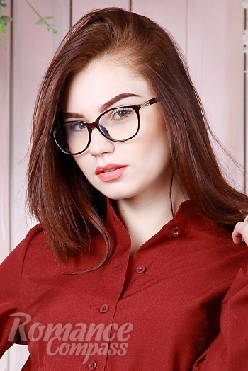 Ukrainian mail order bride Anna from Kharkiv with red hair and green eye color - image 1