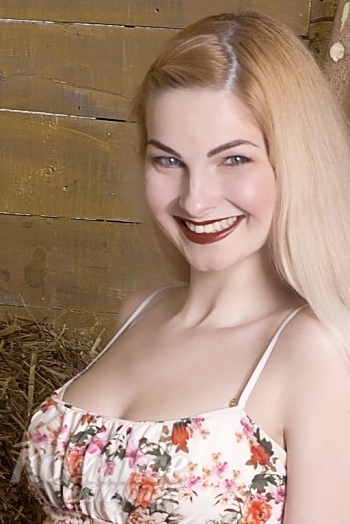 Ukrainian mail order bride Evgeniya from Sumy with blonde hair and blue eye color - image 1