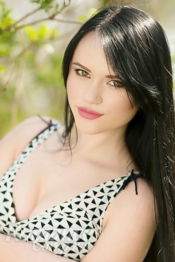 Ukrainian mail order bride Yana from Lugansk with black hair and green eye color - image 1