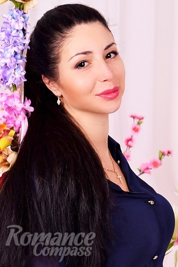 Ukrainian mail order bride Marina from Odessa with black hair and black eye color - image 1