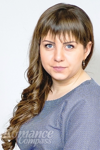 Ukrainian mail order bride Eugene from Lugansk with brunette hair and blue eye color - image 1