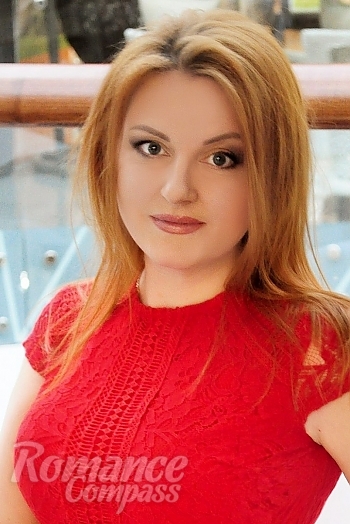 Ukrainian mail order bride Anna from Odessa with red hair and blue eye color - image 1