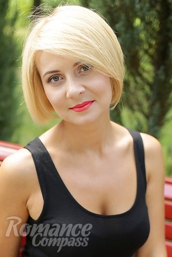 Ukrainian mail order bride Oksana from Kharkov with blonde hair and green eye color - image 1