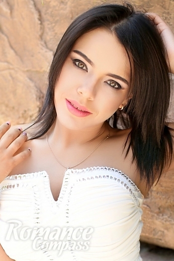 Ukrainian mail order bride Anna from Kharkov with black hair and green eye color - image 1