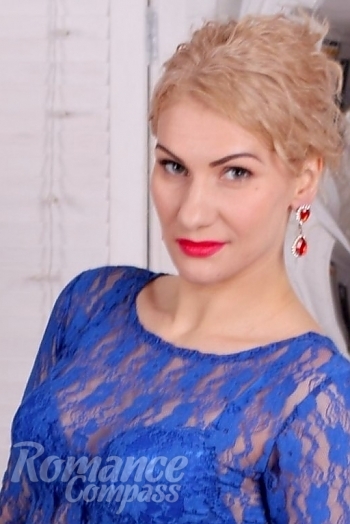 Ukrainian mail order bride Victoria from Nikopol with blonde hair and blue eye color - image 1