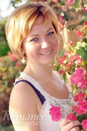 Ukrainian mail order bride Alina from Kharkov with blonde hair and blue eye color - image 1