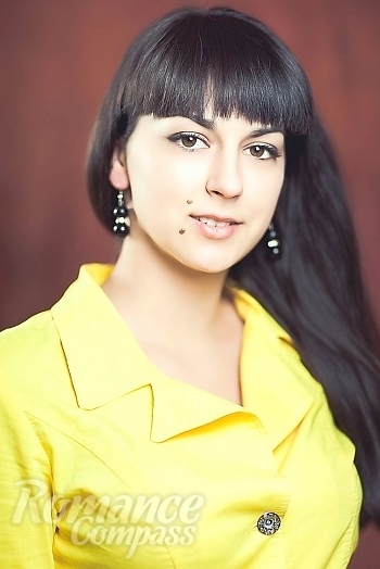 Ukrainian mail order bride Elena from Nikolaev with black hair and hazel eye color - image 1