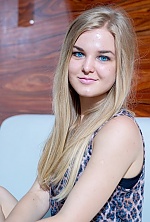 Ukrainian mail order bride Oksana from Zaporozhye with blonde hair and blue eye color - image 20