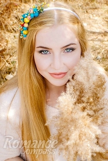 Ukrainian mail order bride Valeria from Kharkov with light brown hair and green eye color - image 1