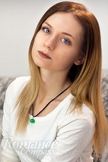 Ukrainian mail order bride Olga from Kharkov with light brown hair and blue eye color - image 1