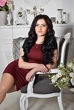 Ukrainian mail order bride Irina from Kiev with black hair and green eye color - image 2