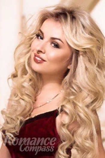 Ukrainian mail order bride Yana from Kiev with blonde hair and blue eye color - image 1