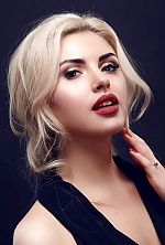Ukrainian mail order bride Oksana from Lugansk with blonde hair and blue eye color - image 56