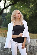 Ukrainian mail order bride Oksana from Lugansk with blonde hair and blue eye color - image 52