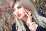 Ukrainian mail order bride Oksana from Lugansk with blonde hair and blue eye color - image 16