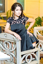 Ukrainian mail order bride Oksana from Krivoy Rog with black hair and green eye color - image 6