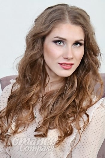 Ukrainian mail order bride Inna from Odessa with light brown hair and green eye color - image 1