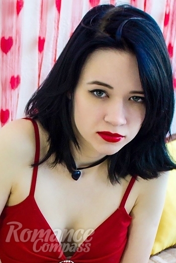 Ukrainian mail order bride Lubov from Nikolaev with black hair and green eye color - image 1