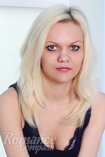 Ukrainian mail order bride Marina from Lugansk with blonde hair and blue eye color - image 1