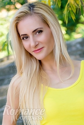 Ukrainian mail order bride Victoria from Nikolaev with blonde hair and hazel eye color - image 1