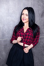 Ukrainian mail order bride Olga from Kiev with black hair and green eye color - image 2